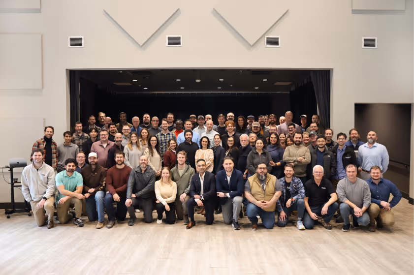 A group of people posing for a photoAI-generated content may be incorrect.