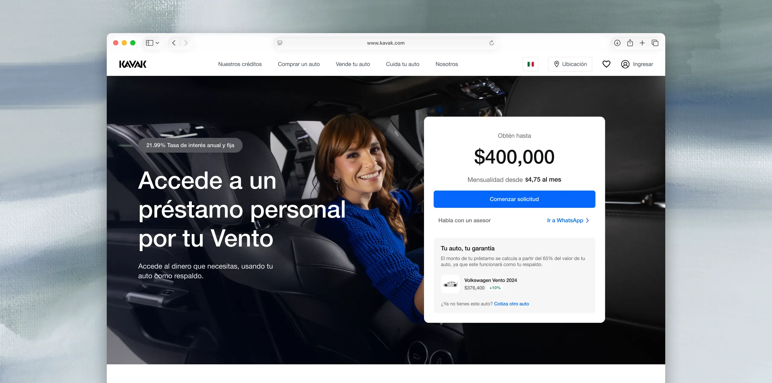 Smiling woman in blue sweater sitting in a car seat with personal loan offer on screen.