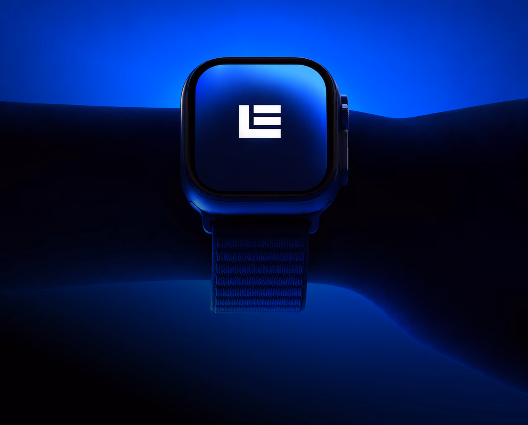 Smartwatch on a wrist displaying the white Lebane logo on its screen, glowing against a deep blue background