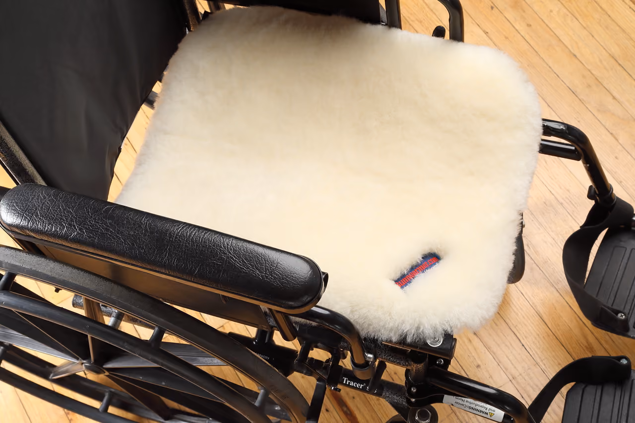 Bumwarmer sheepskin seat cushion on a wheelchair