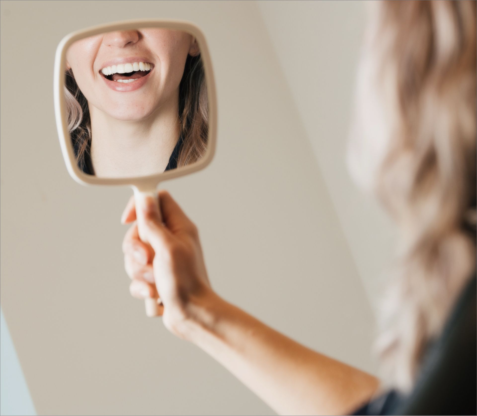 Dentist's hands providing gentle dental care at Prestwick Dentistry