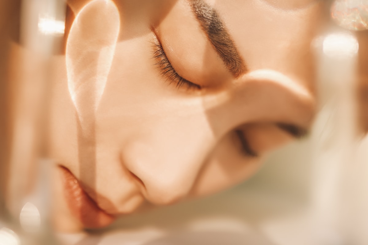Serene portrait of a woman with smooth, healthy skin