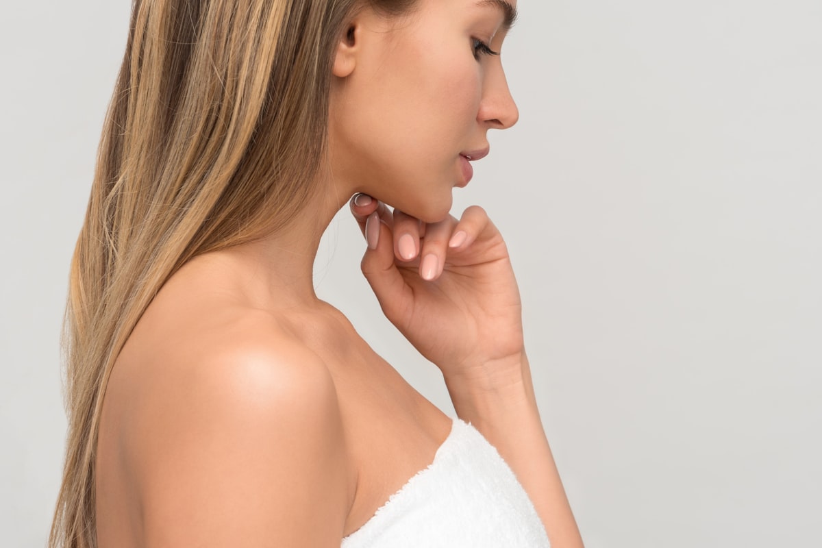 Woman relaxing with calm, soothed skin