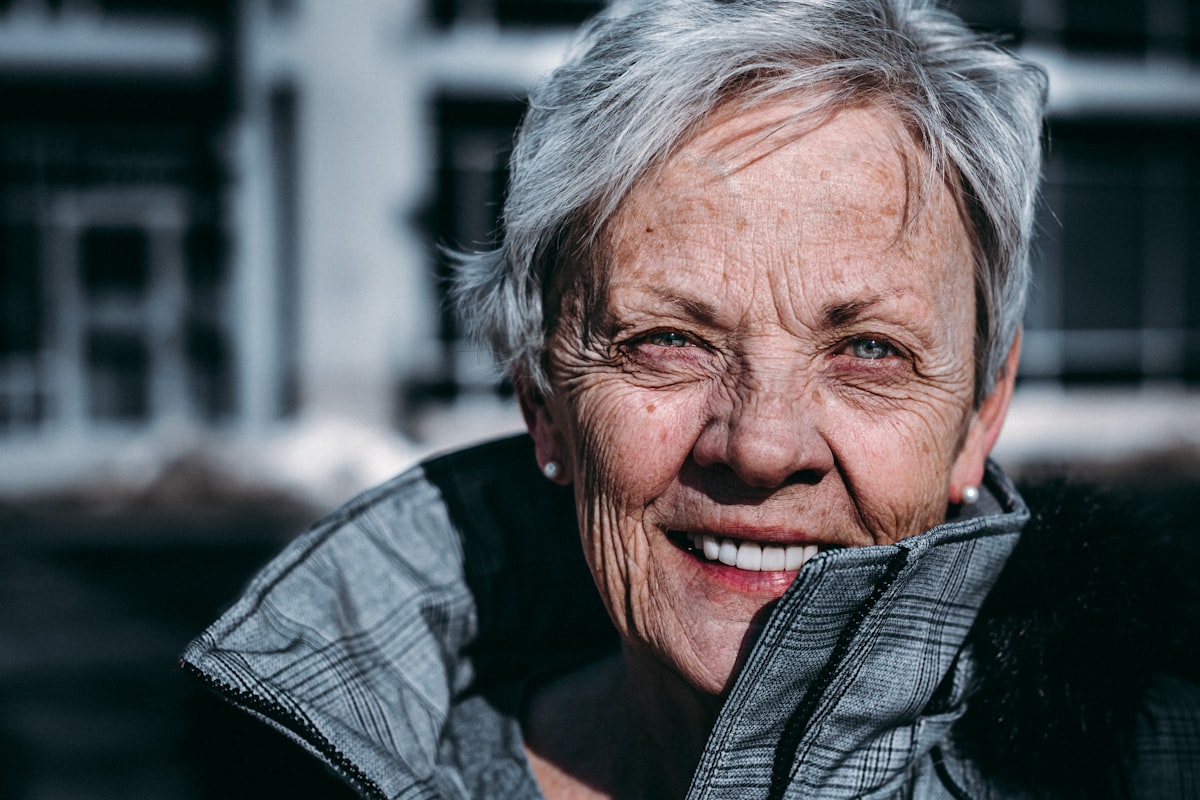 Smiling woman with naturally healthy skin