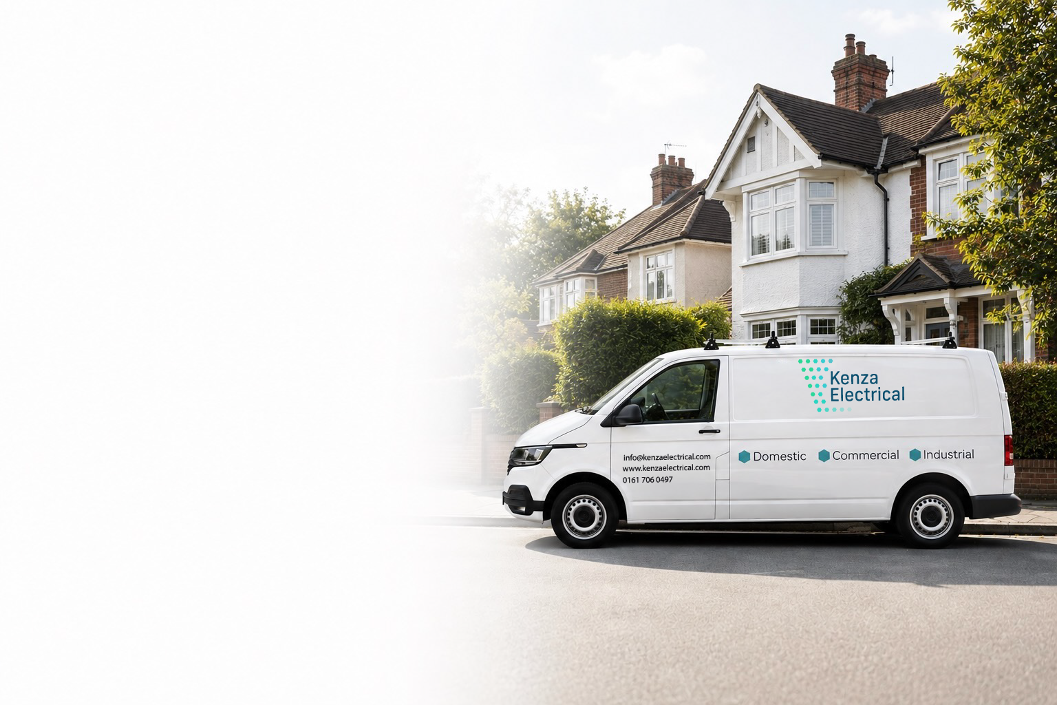 White Kenza Electrical van parked on street in front of residential houses.