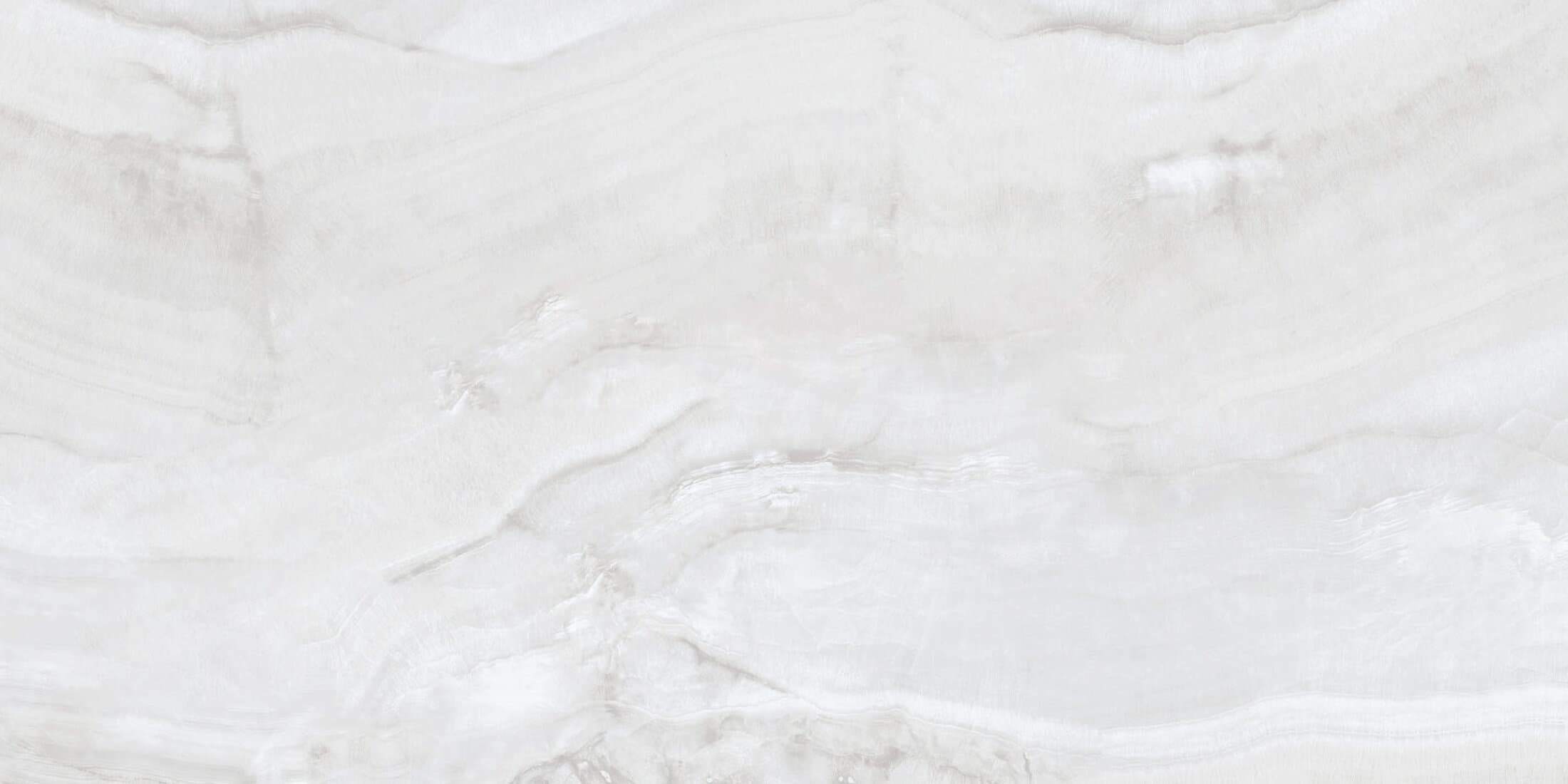 White marble texture with subtle gray veining and smooth polished surface.