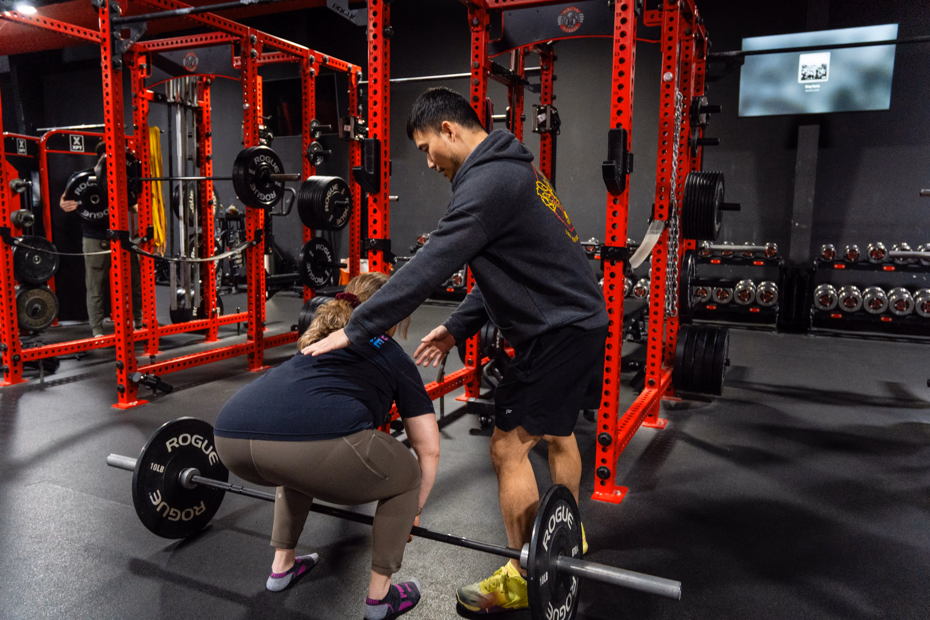 Coach assist deadlift at Kinitro Fitness.