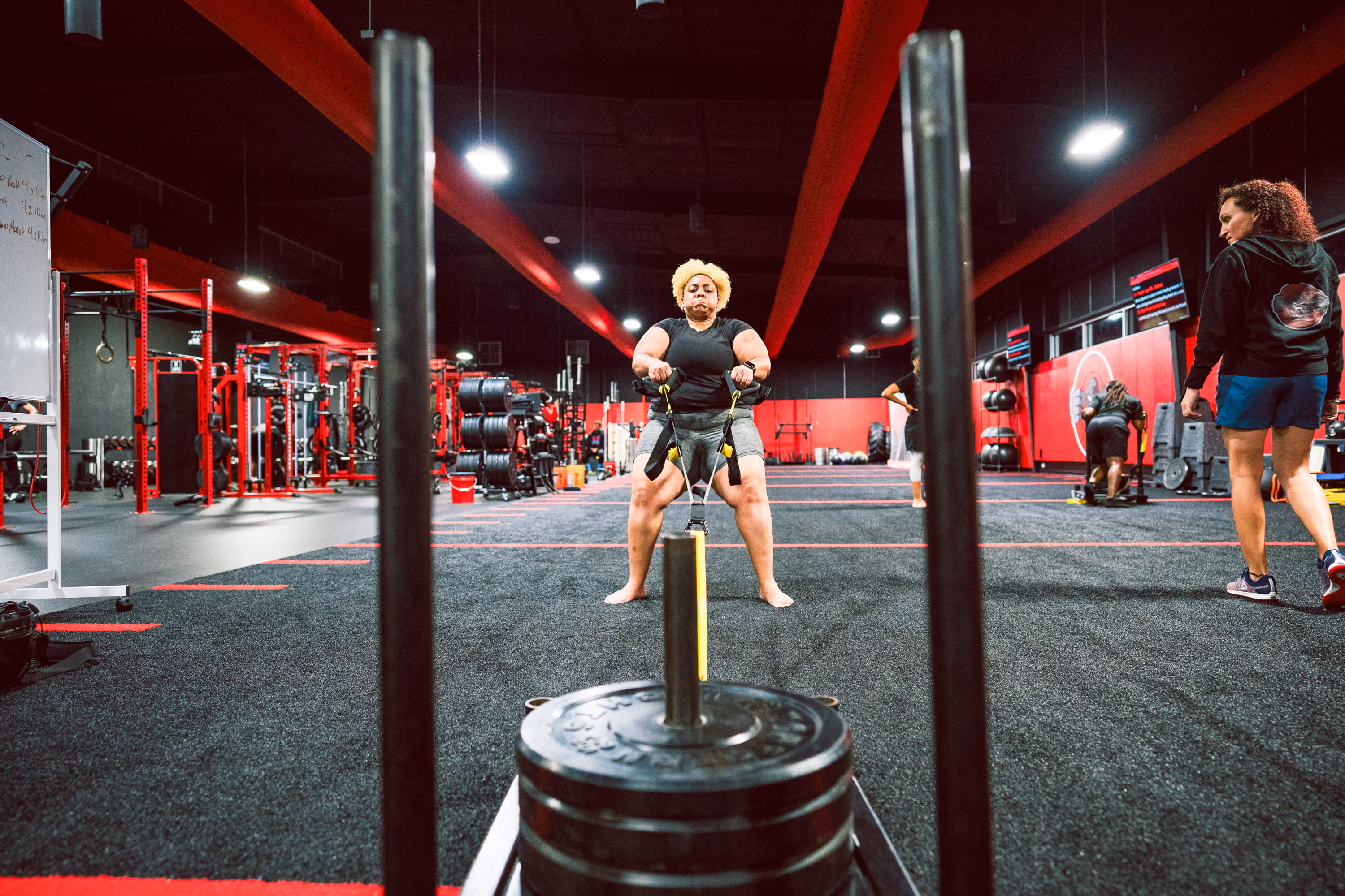 Woman performing box jump at Kinitro Fitness.