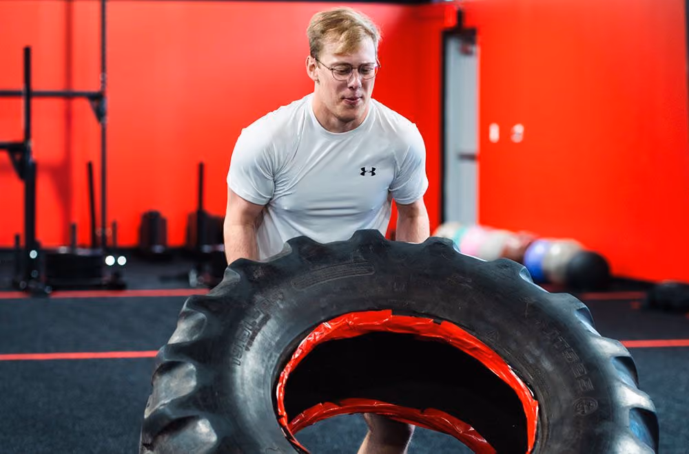 Strongman tire flip at Kinitro Fitness