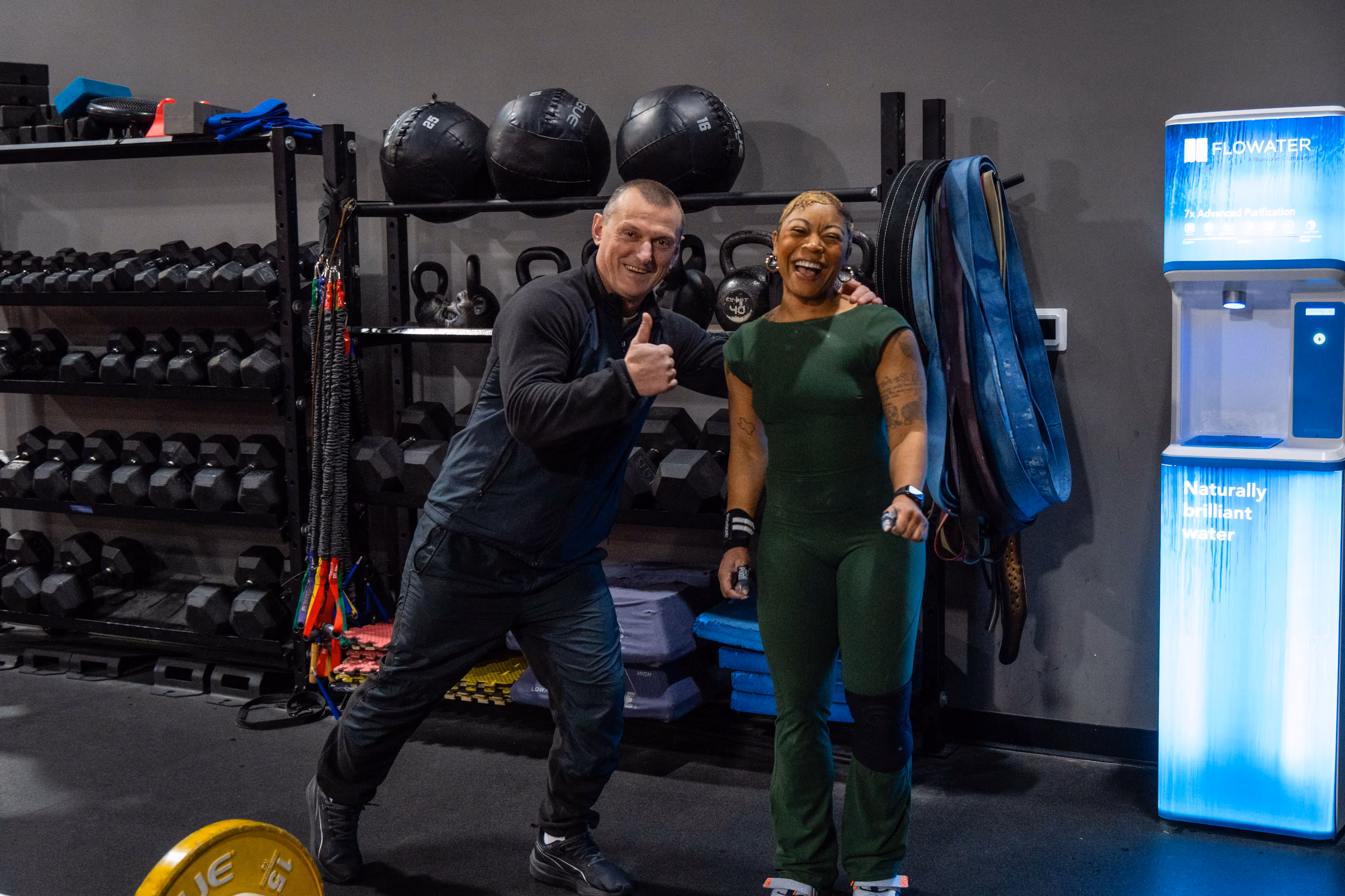 Coach greeting a client at Kinitro Fitness