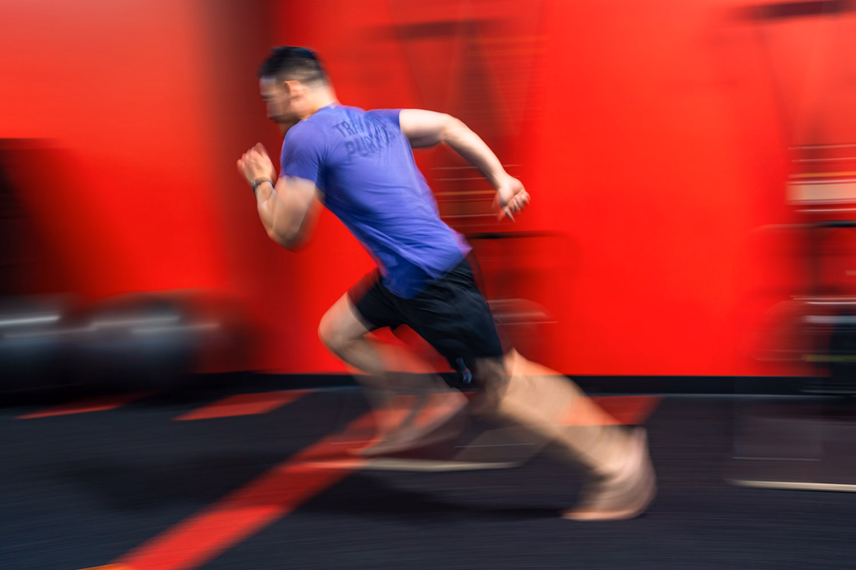 Man running during a coached training session at Kinitro Fitness