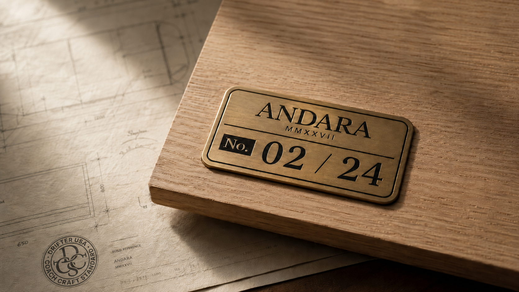 Brass Andara plate numbered 02 of 24 on oak over stamped Drifter build drawings