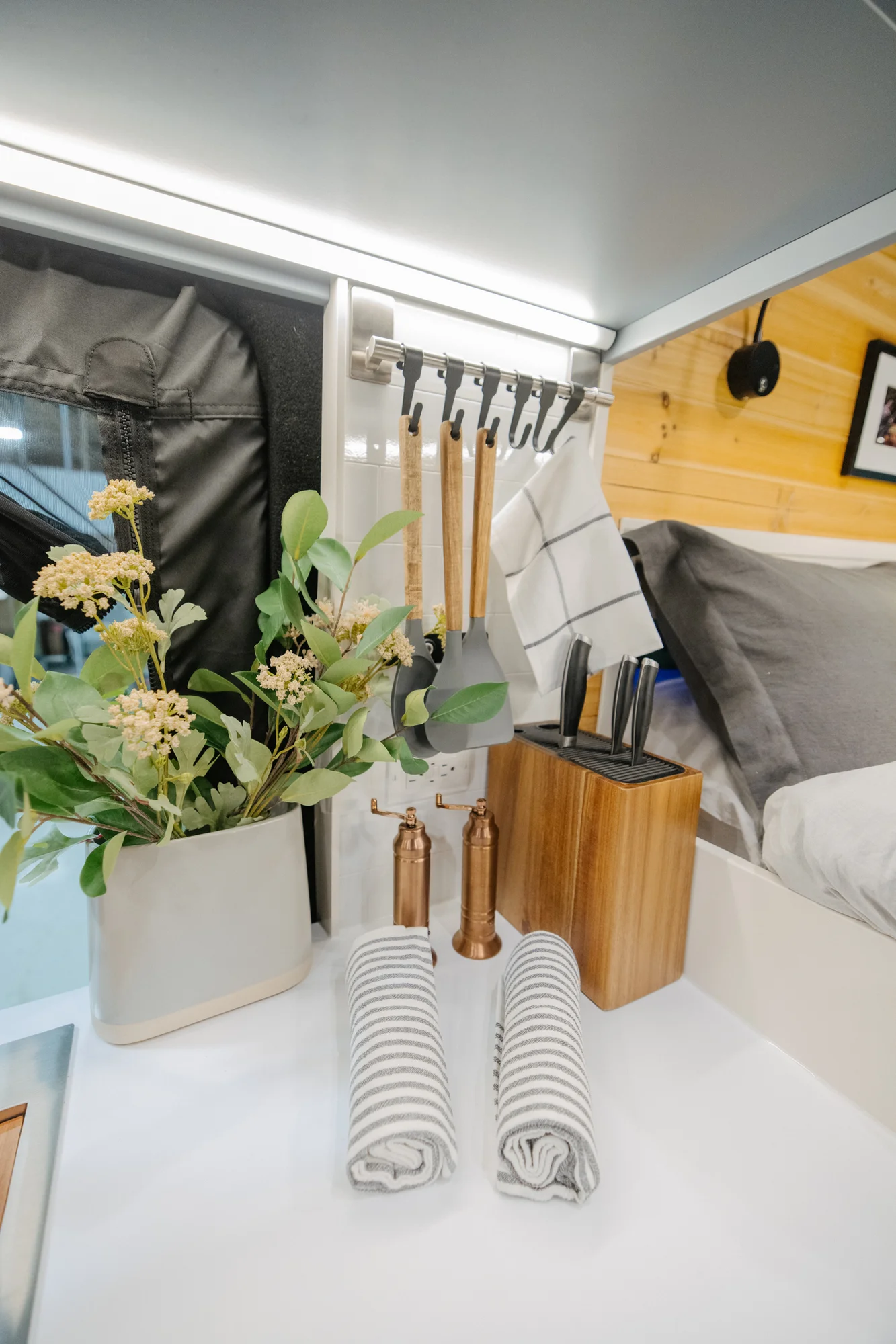 The Drifter 101 custom Ford Transit campervan built for Derek by Drifter Vans, Wanderer layout with a rear Overland Kitchen, knotty pine walls, and grey cabinetry