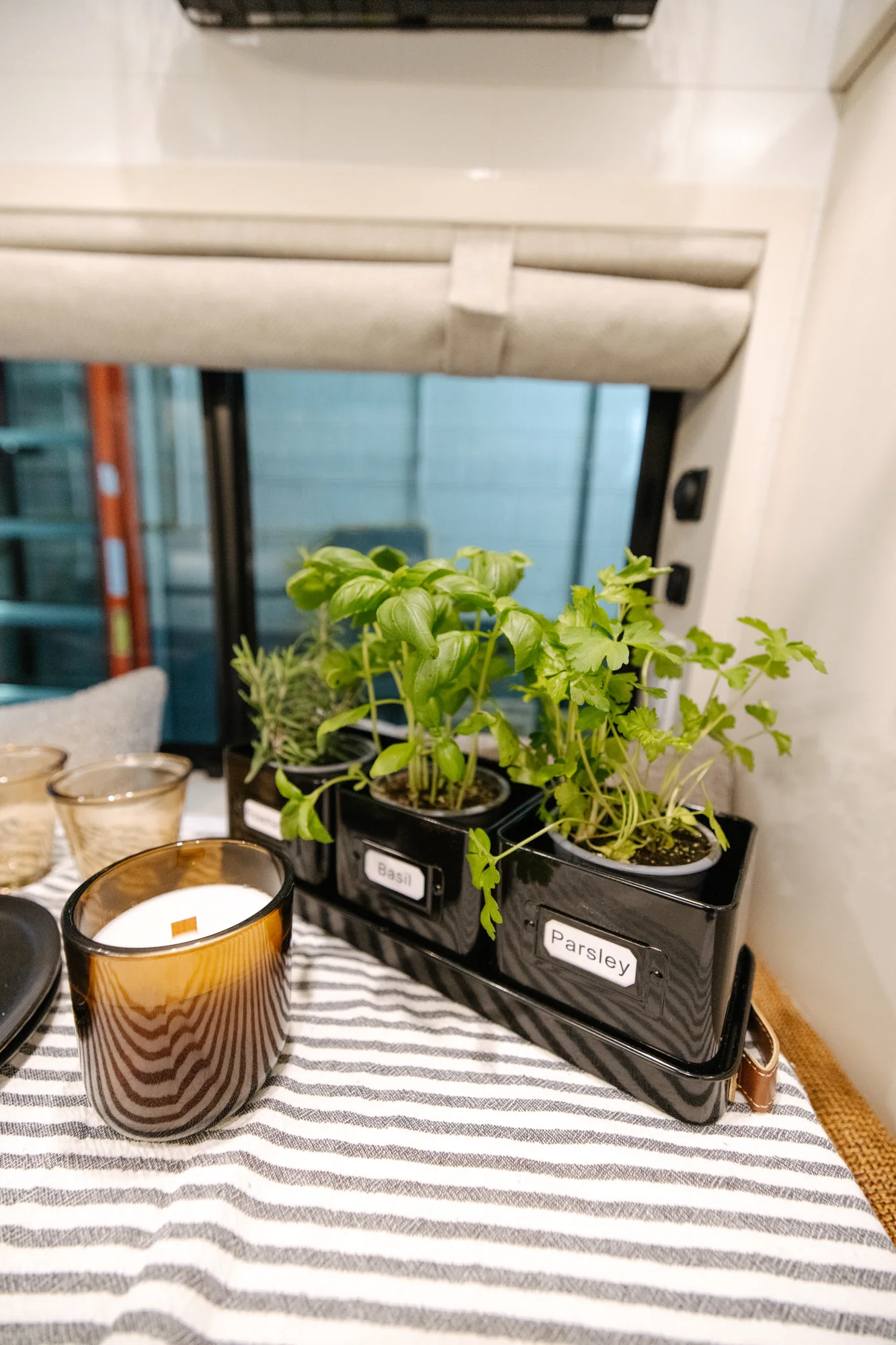 The Drifter 101 custom Ford Transit campervan built for Derek by Drifter Vans, Wanderer layout with a rear Overland Kitchen, knotty pine walls, and grey cabinetry