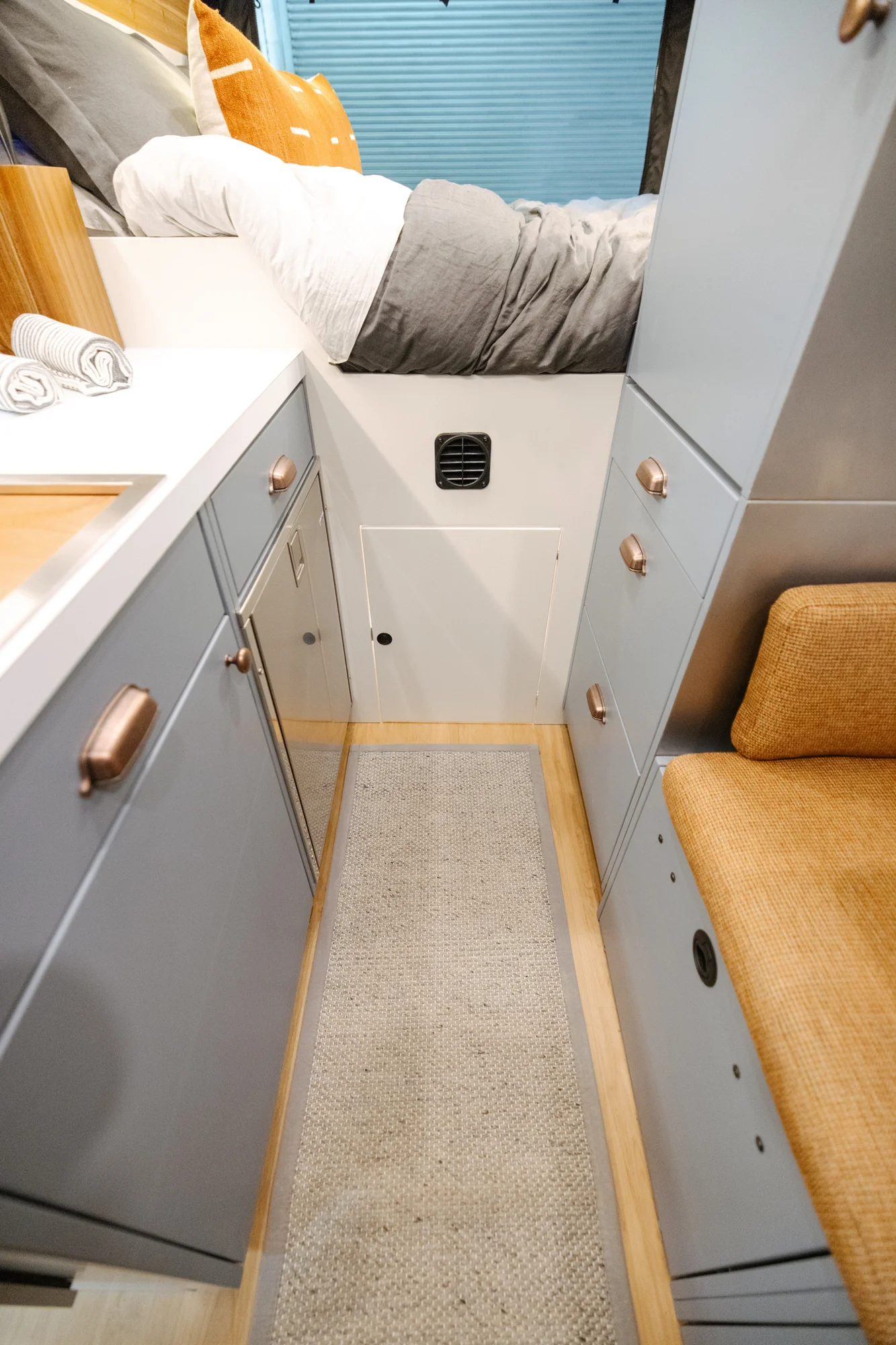 The Drifter 101 custom Ford Transit campervan built for Derek by Drifter Vans, Wanderer layout with a rear Overland Kitchen, knotty pine walls, and grey cabinetry