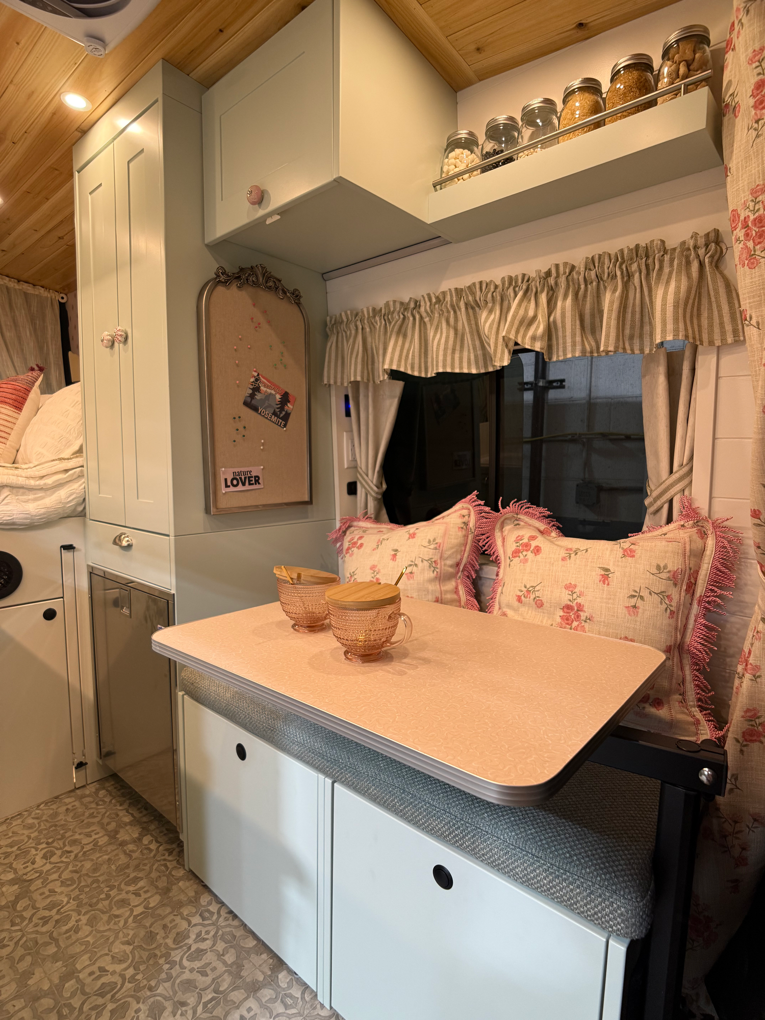 The Drifter 101 custom Ford Transit campervan built for Lori Smith by Drifter Vans, Drifter layout with a cottage garden-inspired interior, handcrafted cabinetry, and custom luxury finishes