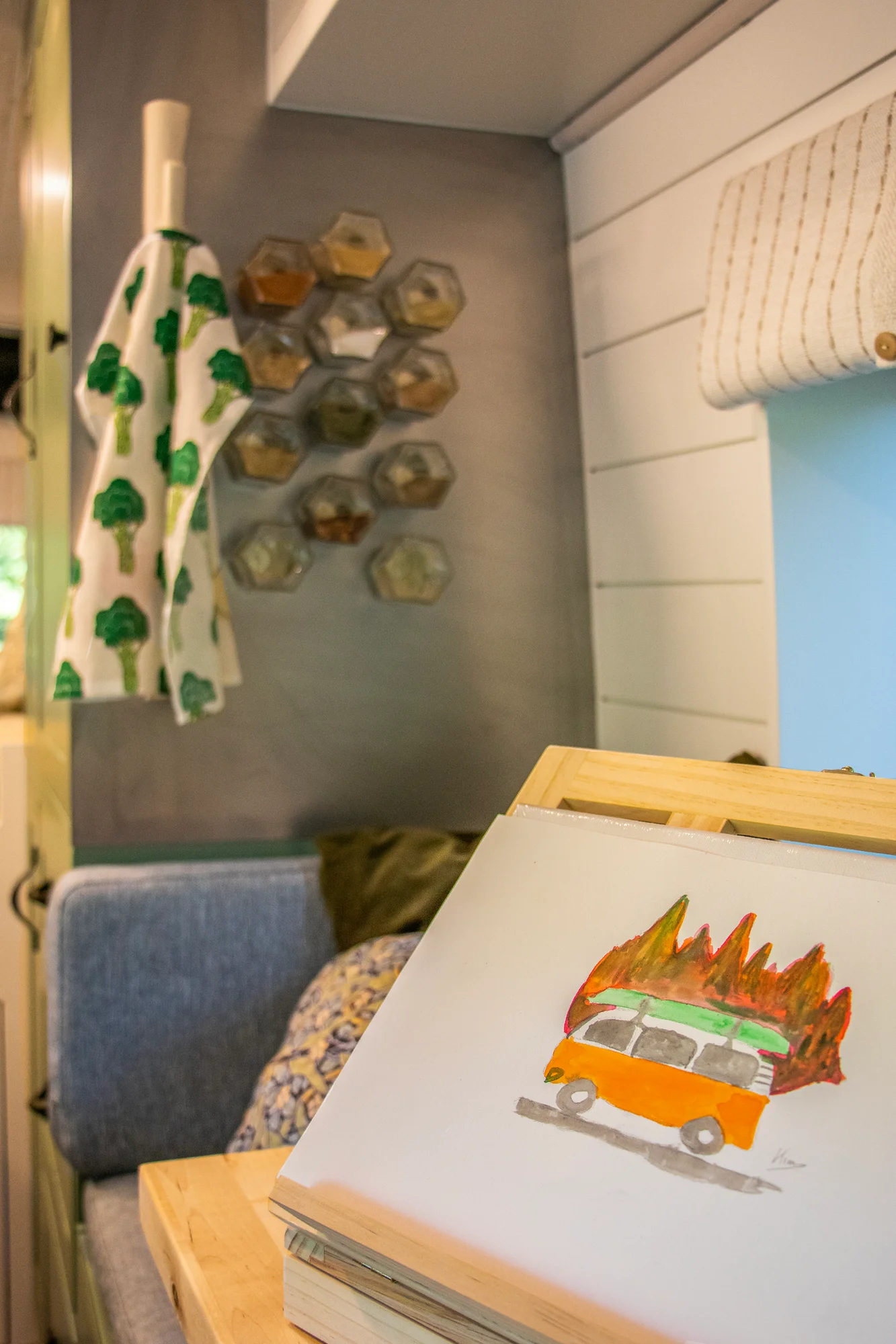 The Drifter 101 custom Ford Transit campervan built for Steph and Jen by Drifter Vans, Wanderer layout with a brick backsplash, sage green cabinetry, and farmhouse lighting