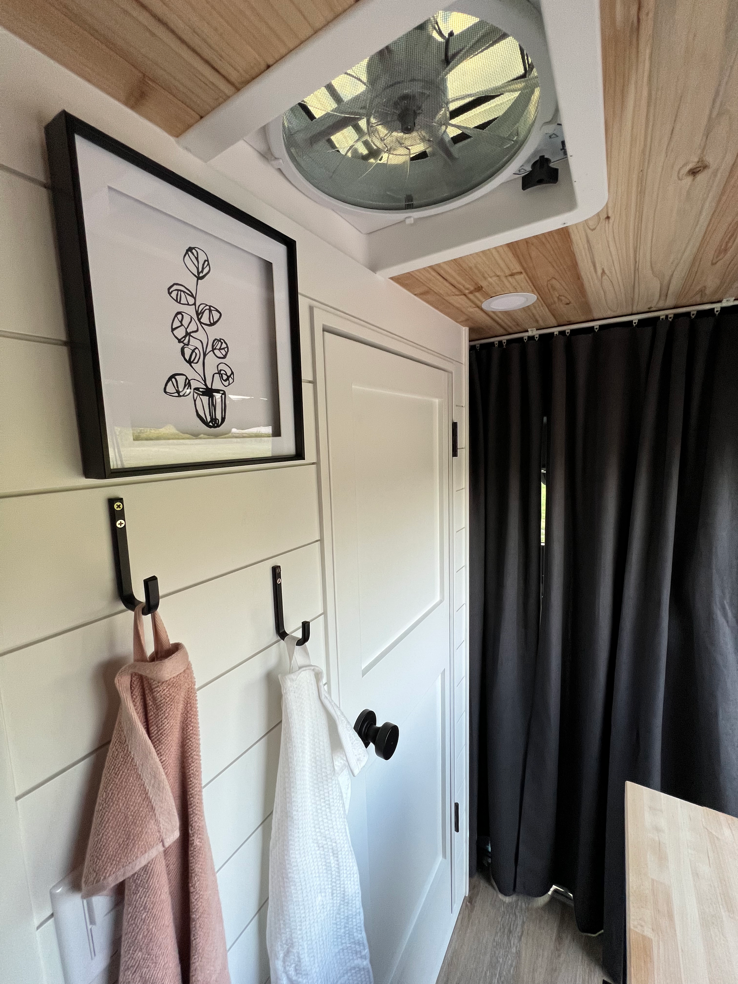 The Drifter 101 custom Mercedes-Benz Sprinter campervan built for Katie by Drifter Vans, with a pink boho interior, butcher block countertop, natural textures, and a full shower