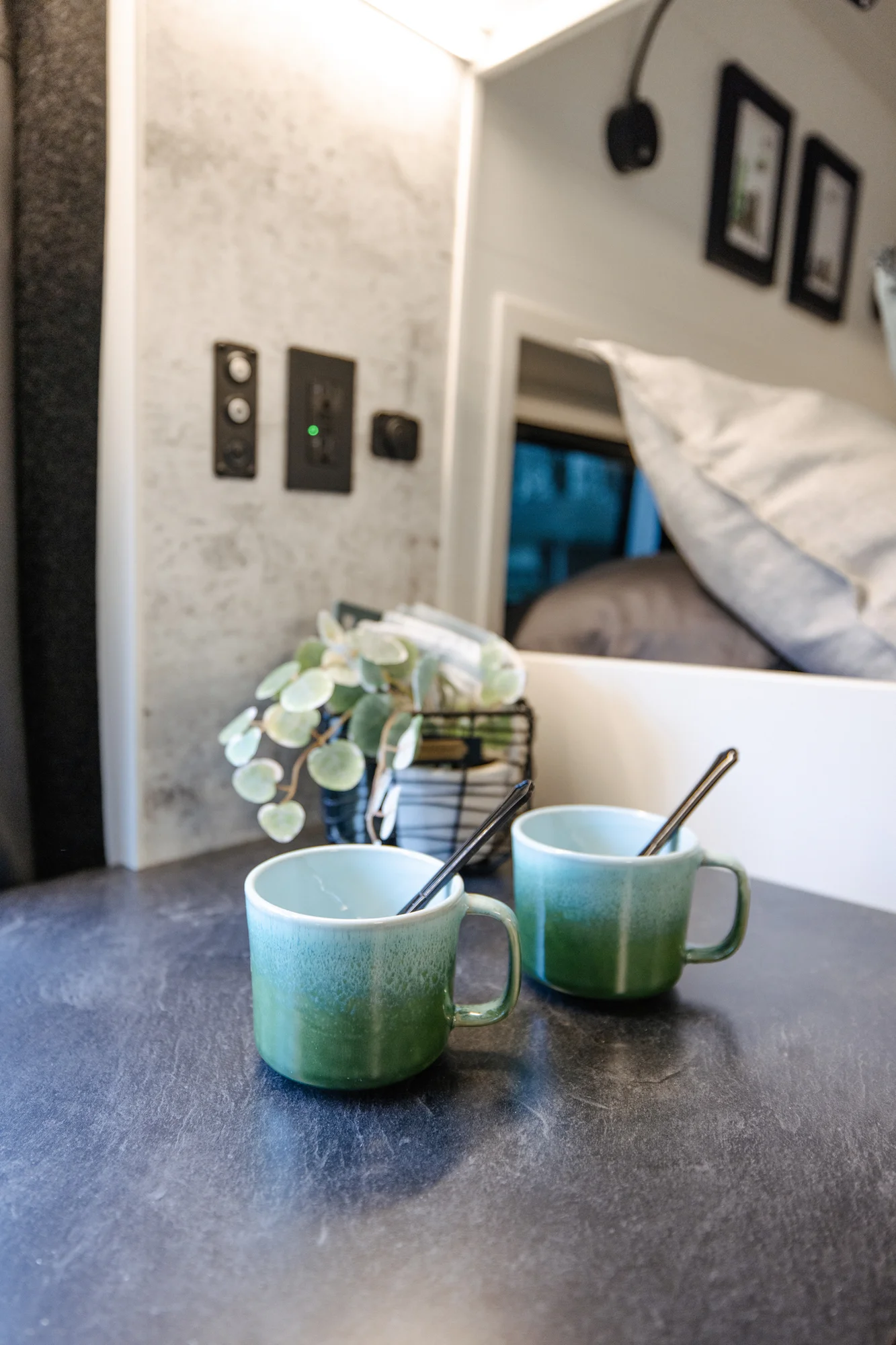 The Drifter 101 custom Ford Transit campervan built for Lisa by Drifter Vans, Wanderer layout with a beachy coastal interior, light blue and white finishes, dog-friendly built-ins, and a swivel chair