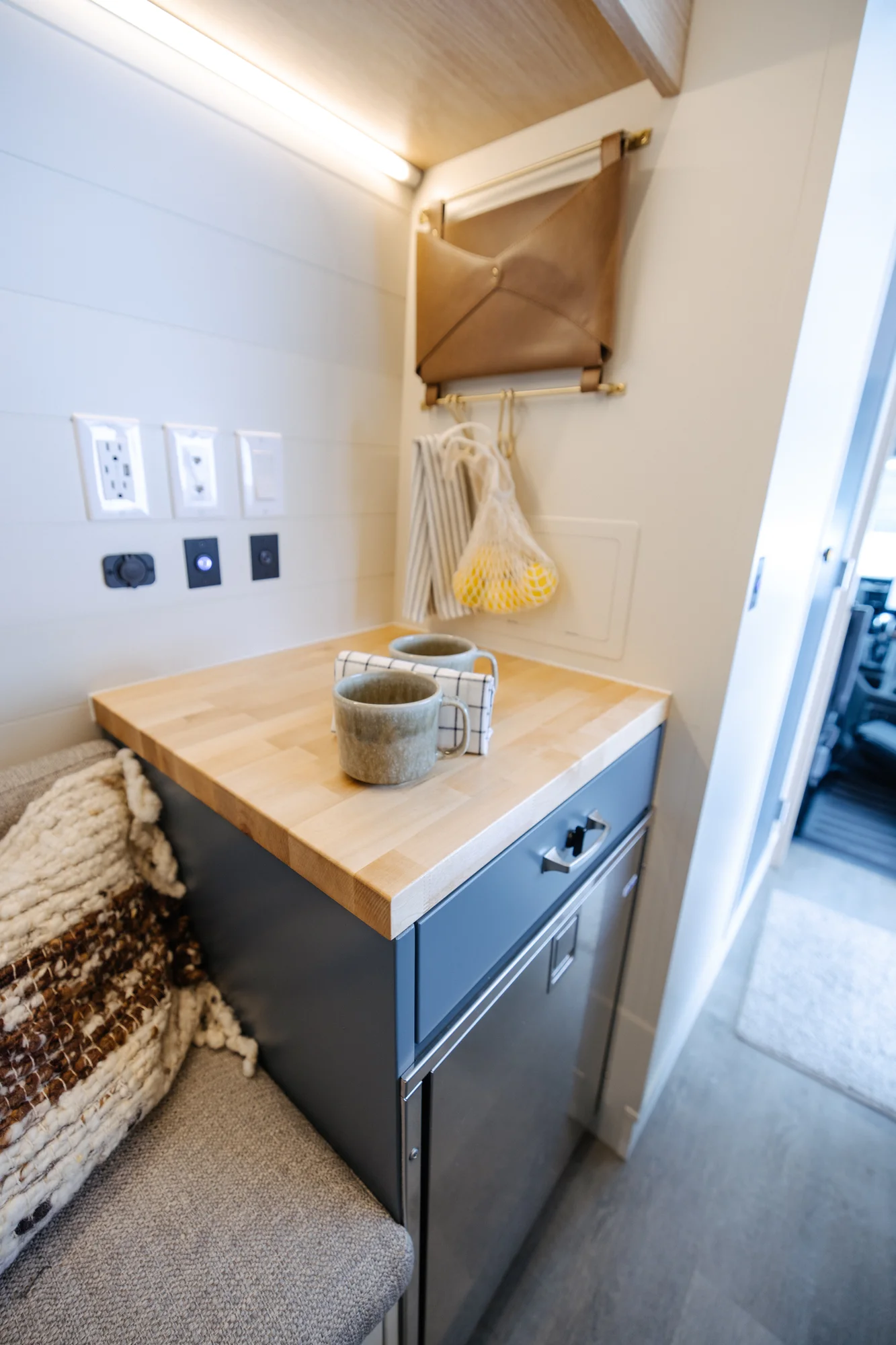 The Drifter 101 custom Ford Transit campervan built for Dan and Karen by Drifter Vans, Nomadik layout with an Indian autumn stone wet bath, trifold door, Aluminus bumper, and FVCO roof rack