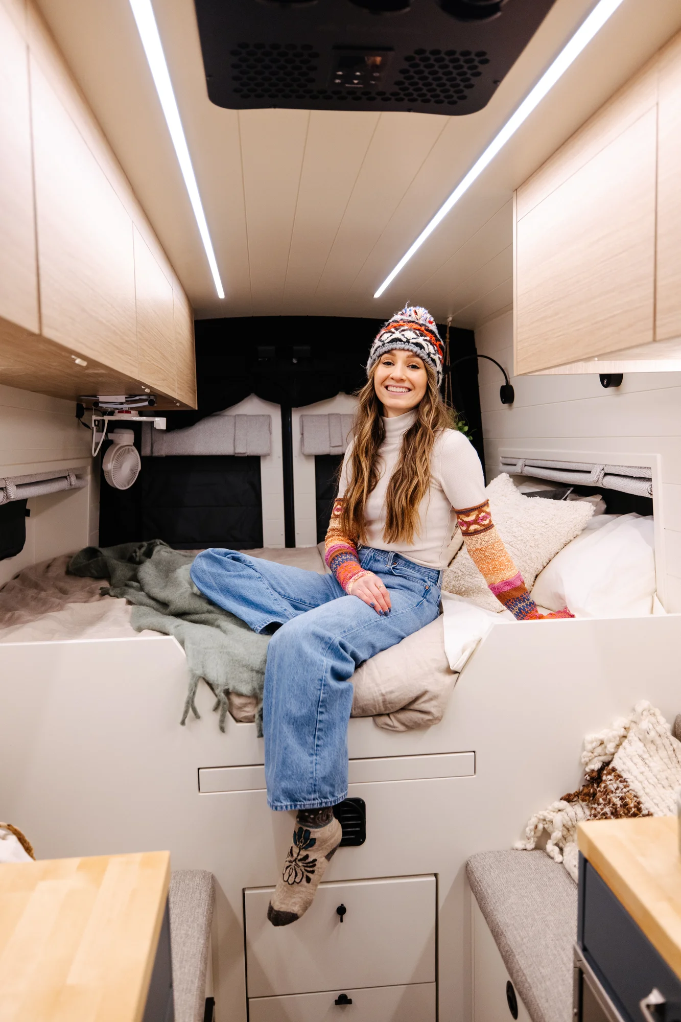 The Drifter 101 custom Ford Transit campervan built for Dan and Karen by Drifter Vans, Nomadik layout with an Indian autumn stone wet bath, trifold door, Aluminus bumper, and FVCO roof rack