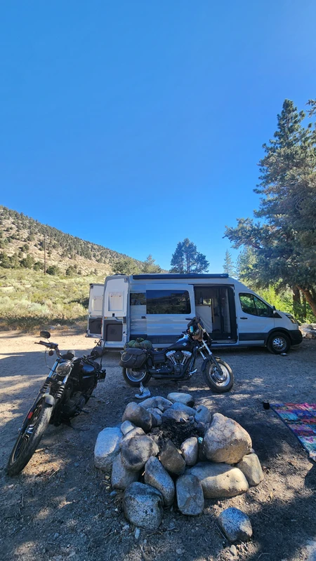 Travel nurse van life – Tess’s first basic Nissan cargo van with a simple DIY setup before her custom Class B motorhome