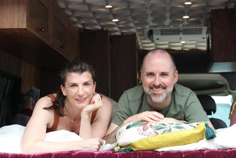 Interior designer Stephanie from Drifter Vans inside her new Drifter Van, enjoying time with her husband.
