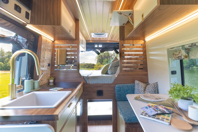 Ford transit camper van interior with boho vibes
