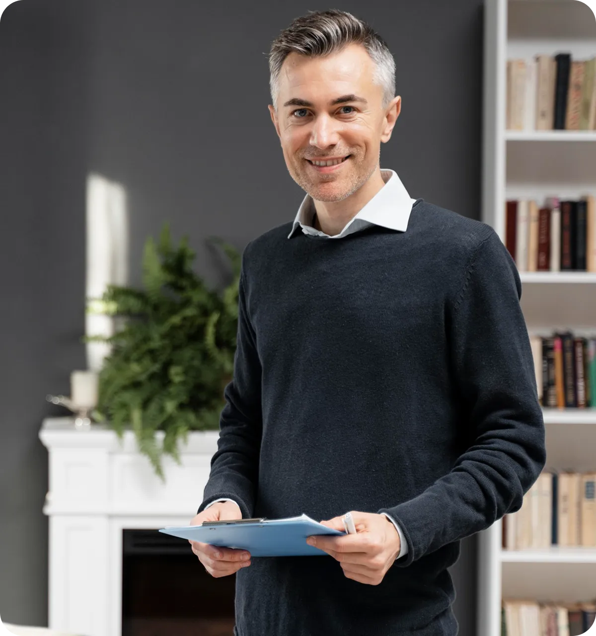 Teacher holding a tablet and smiling