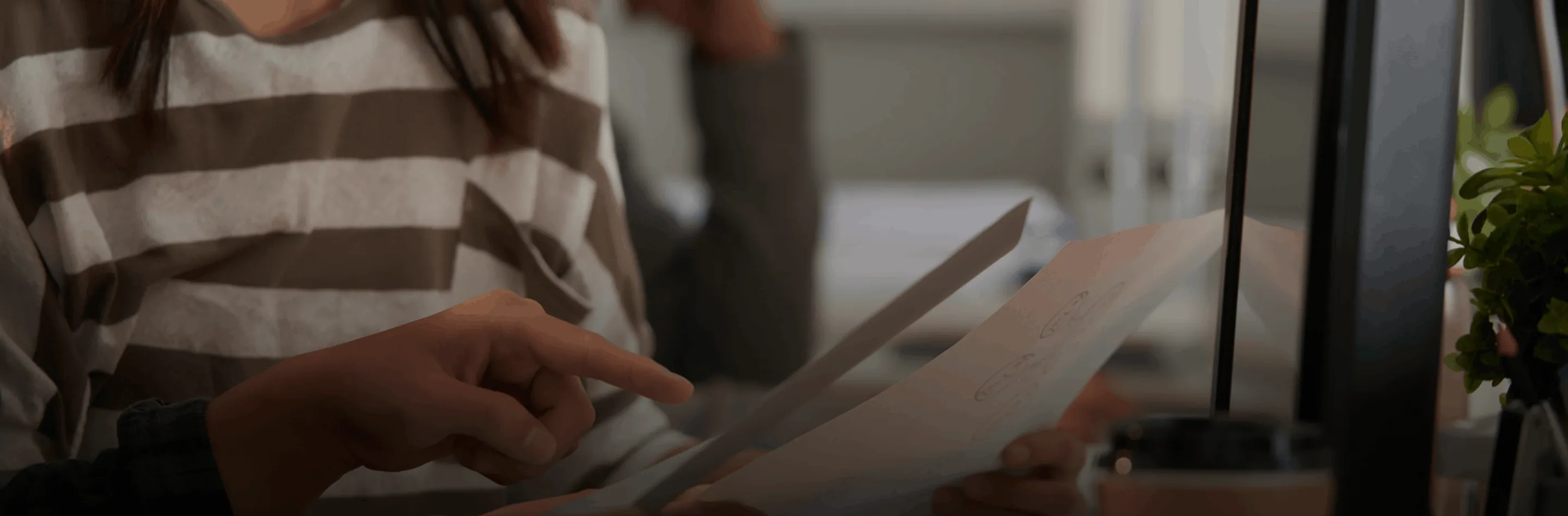 Person using a tablet at a desk