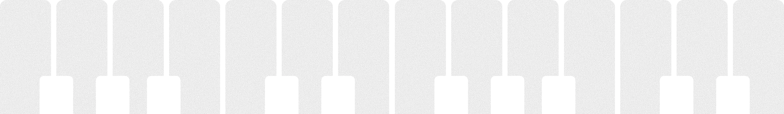 Close-up of piano keys showing black and white keys on keyboard.