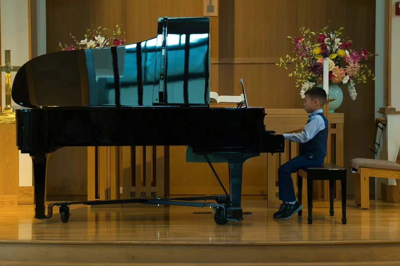 Audrey Huang performing at a piano recital