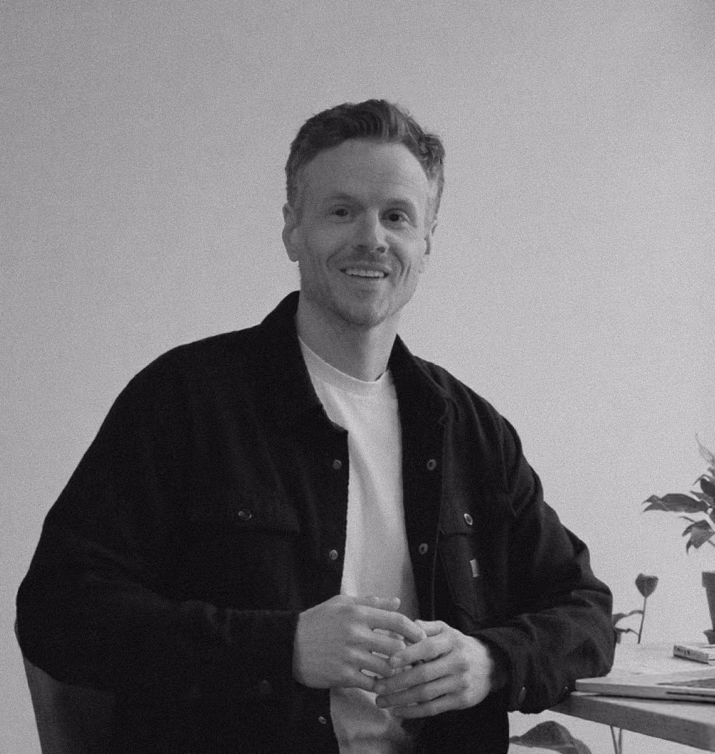 Matt of Greater Than on a video call at his desk
