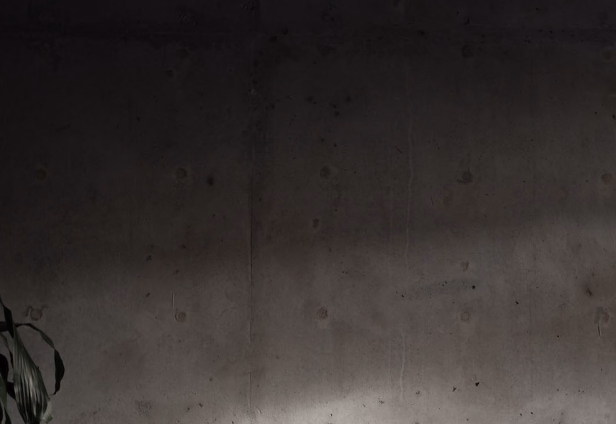 Textured grey concrete wall
