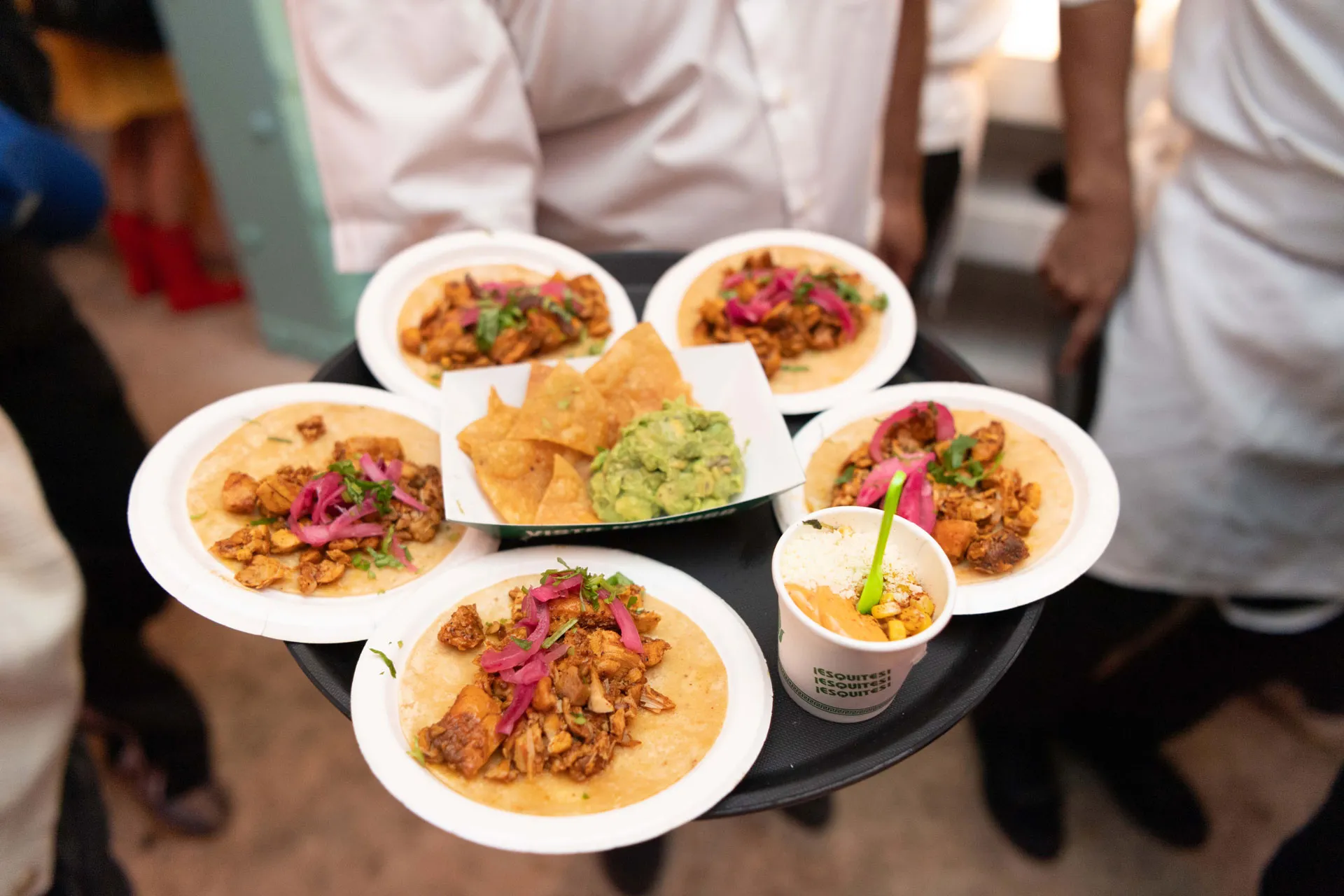 A tray of food with a variety of items on it.