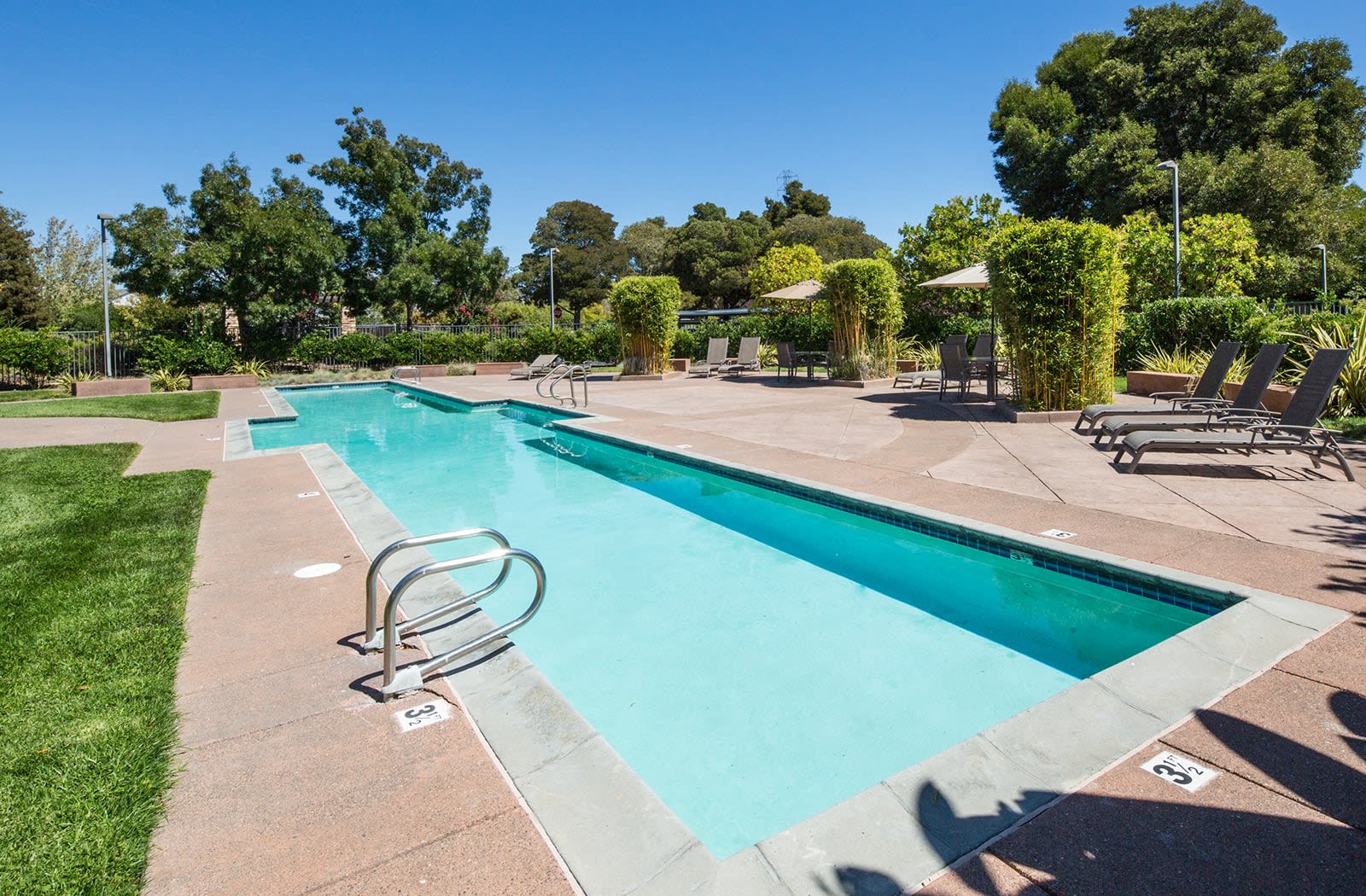 Swimming pool with lounge chairs