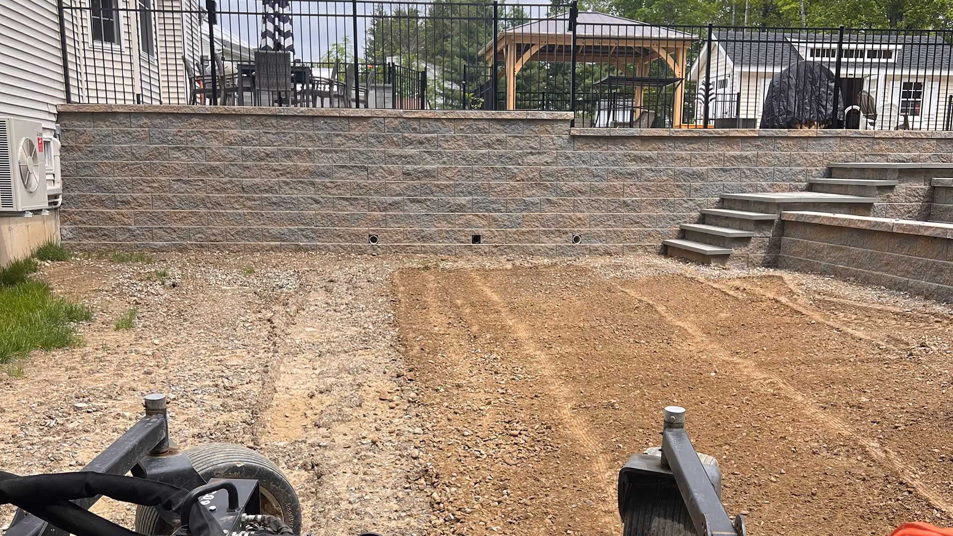 Excavation equipment preparing residential property