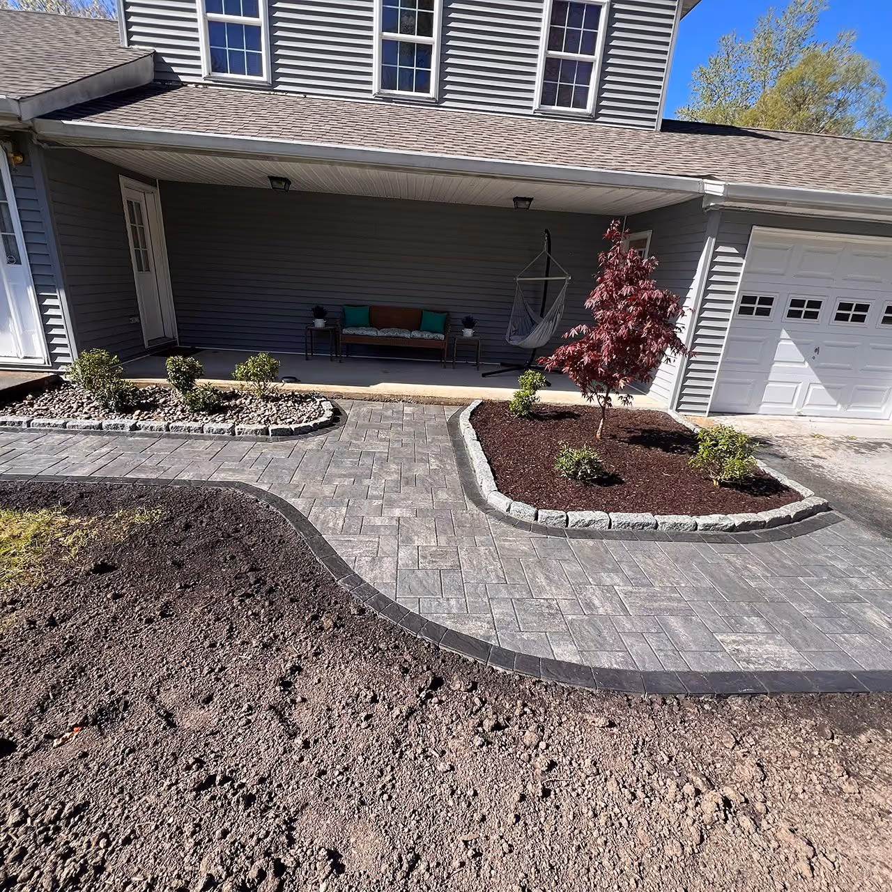 Beautiful backyard paver patio designed for lasting outdoor living by A and G Landscape Design and Excavation
