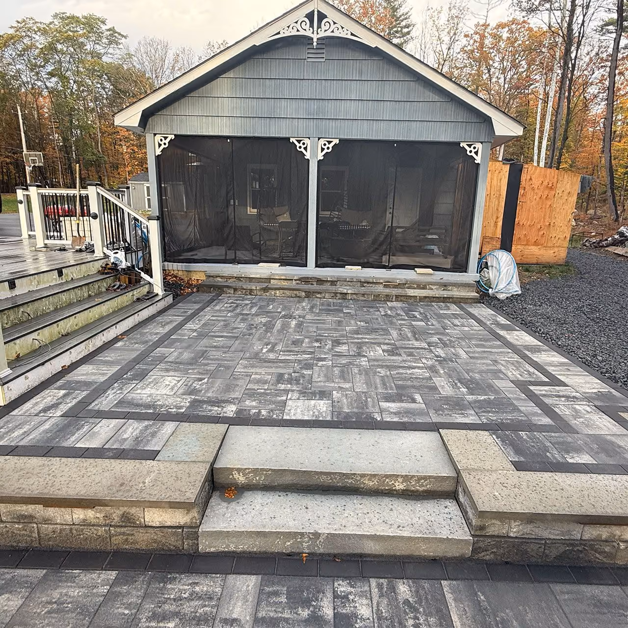 Backyard paver patio and walkway installation