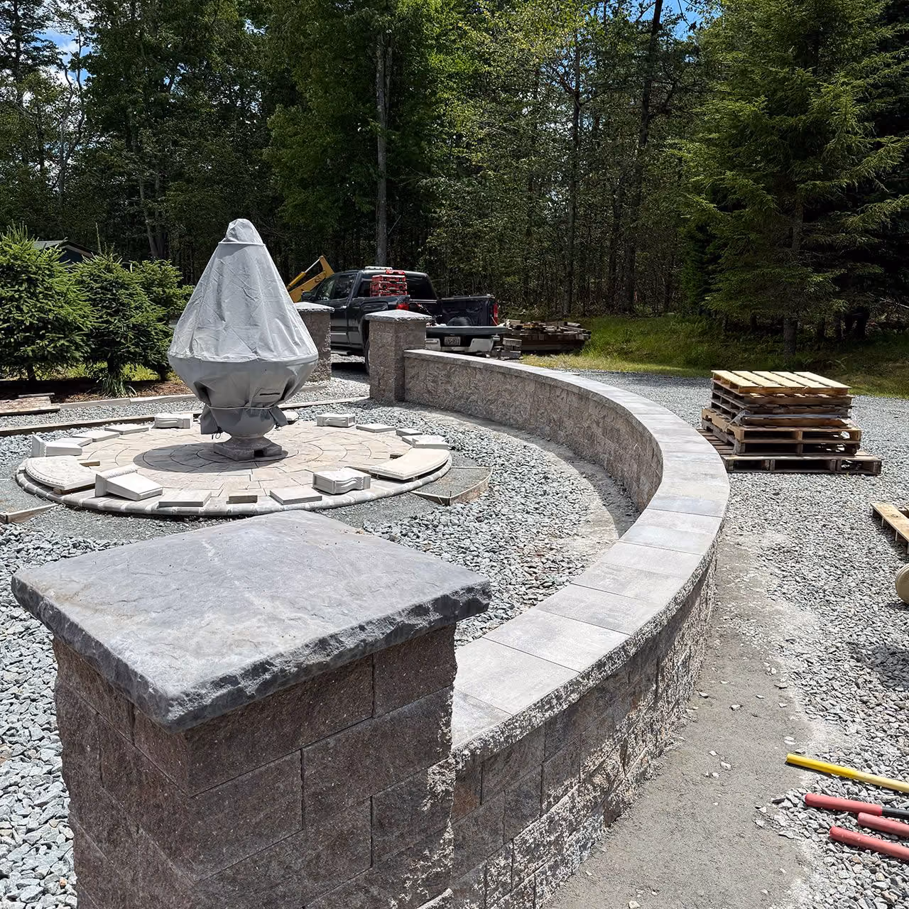 Retaining wall construction near me
Outdoor living space with custom stone hardscape
