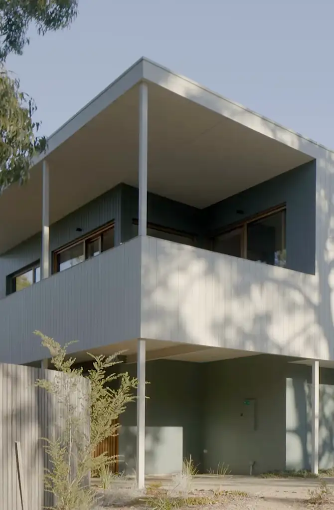 Two-storey Altereco2 passive house exterior with shaded balcony