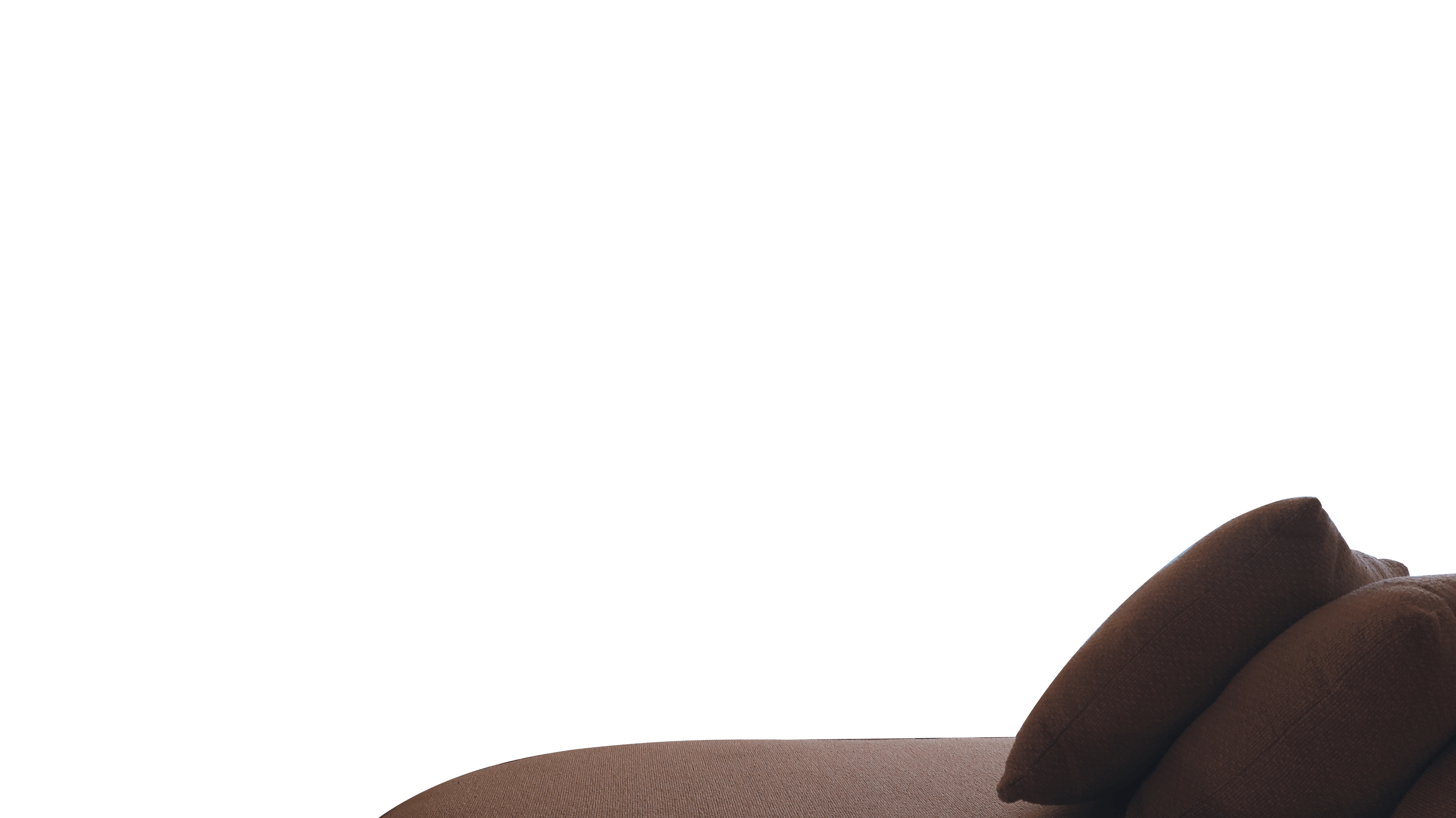 Close-up of brown chair cushion with two matching brown pillows stacked on it. T.M. Kawpeng