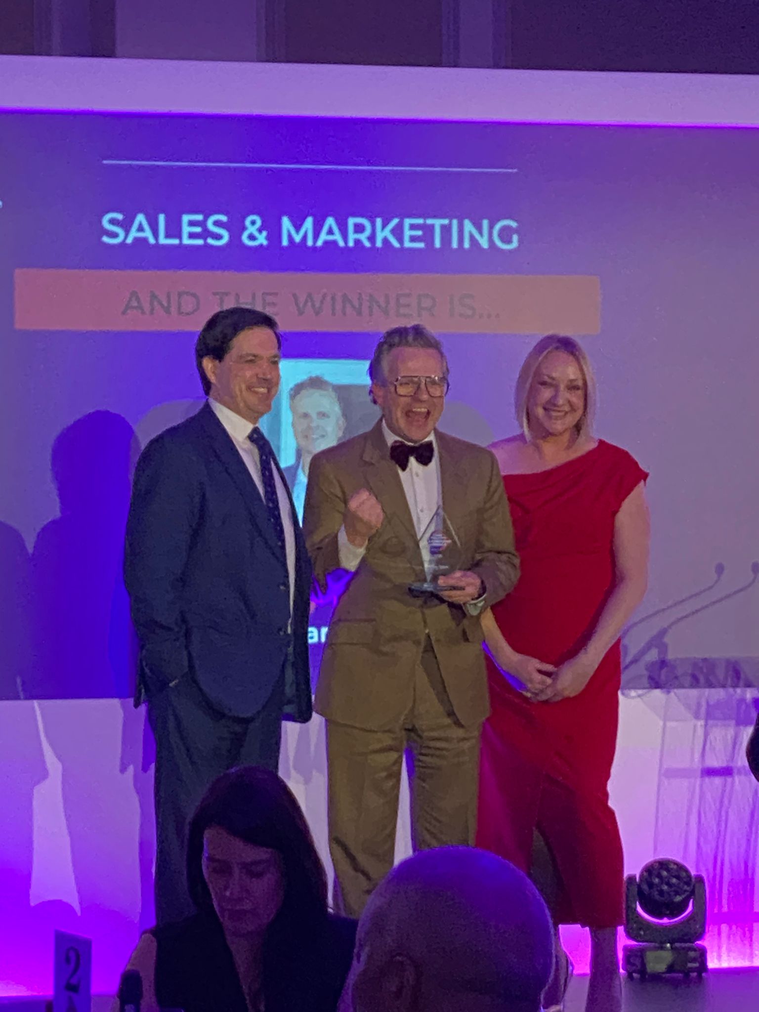 Anthony Tattum on stage collecting the Marketing Leader of the Year 2026 award