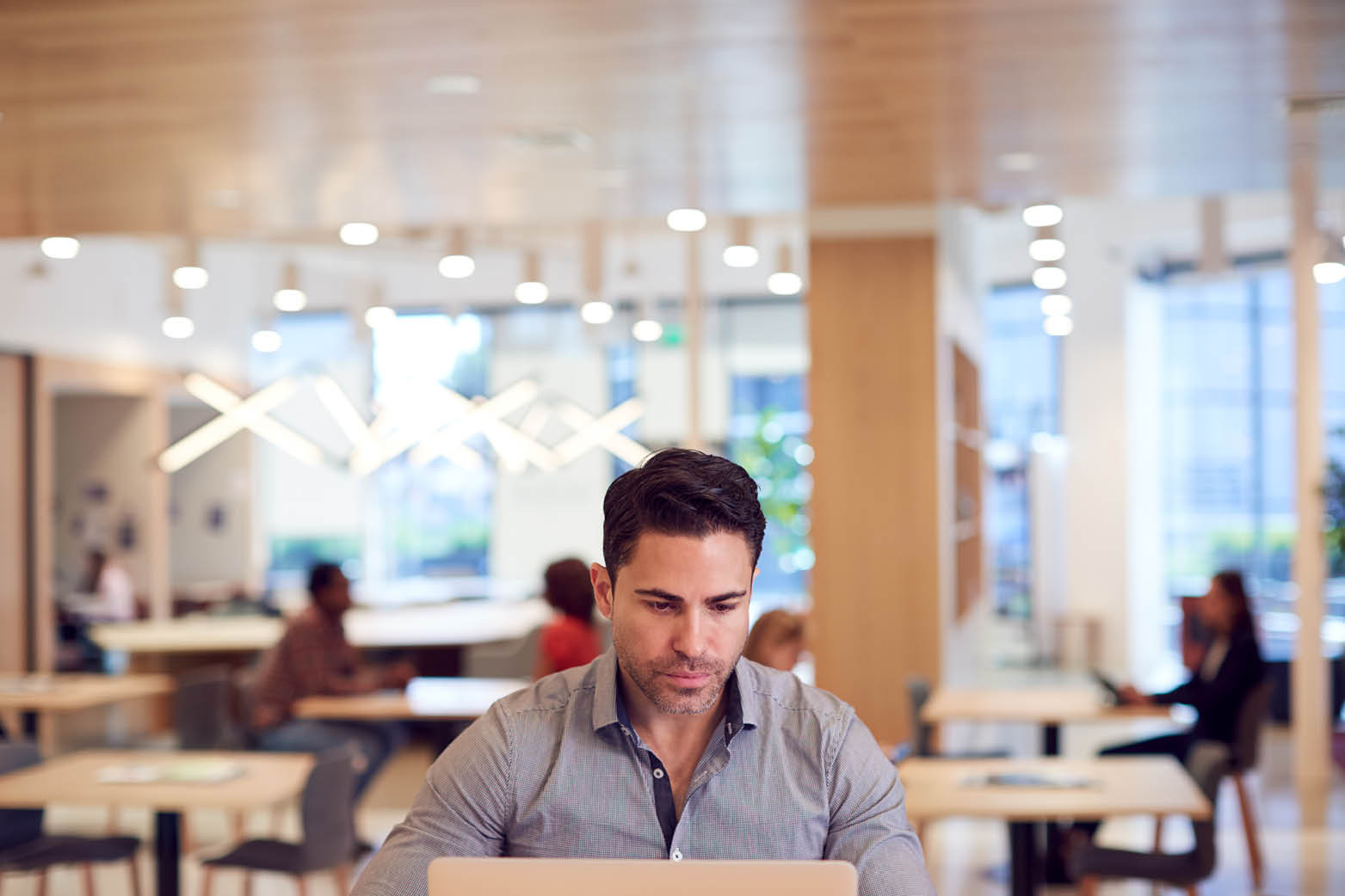 Office worker working in office representing commercial subleasing agreement