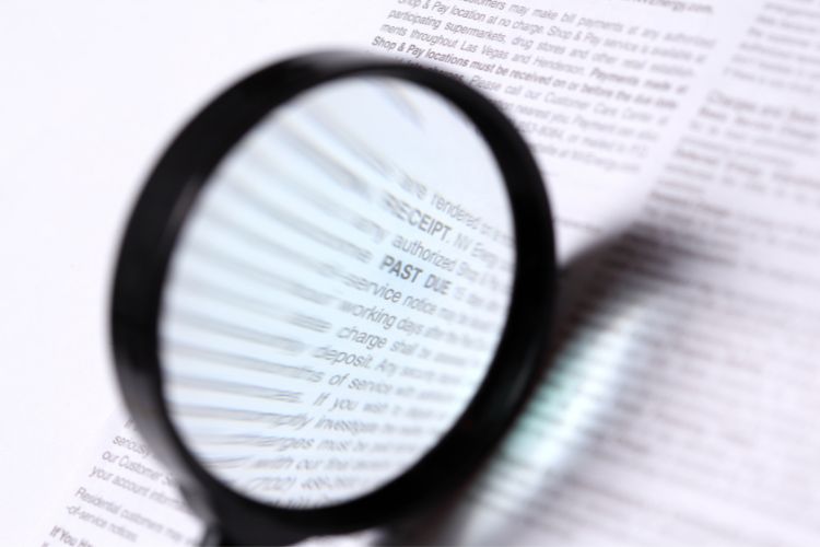 image of microscope over fine print to illustrate reading over the fine print as part of commercial leasing checklist