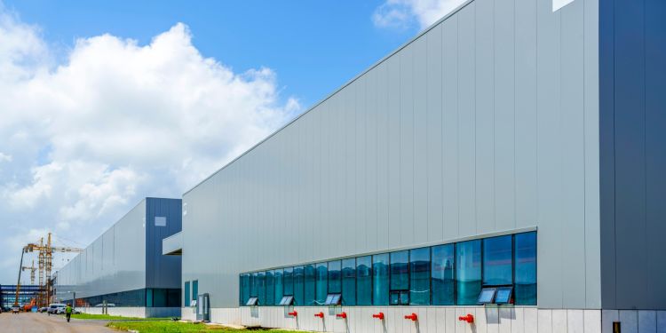 image of the facade of a warehouse representing the industrial markets