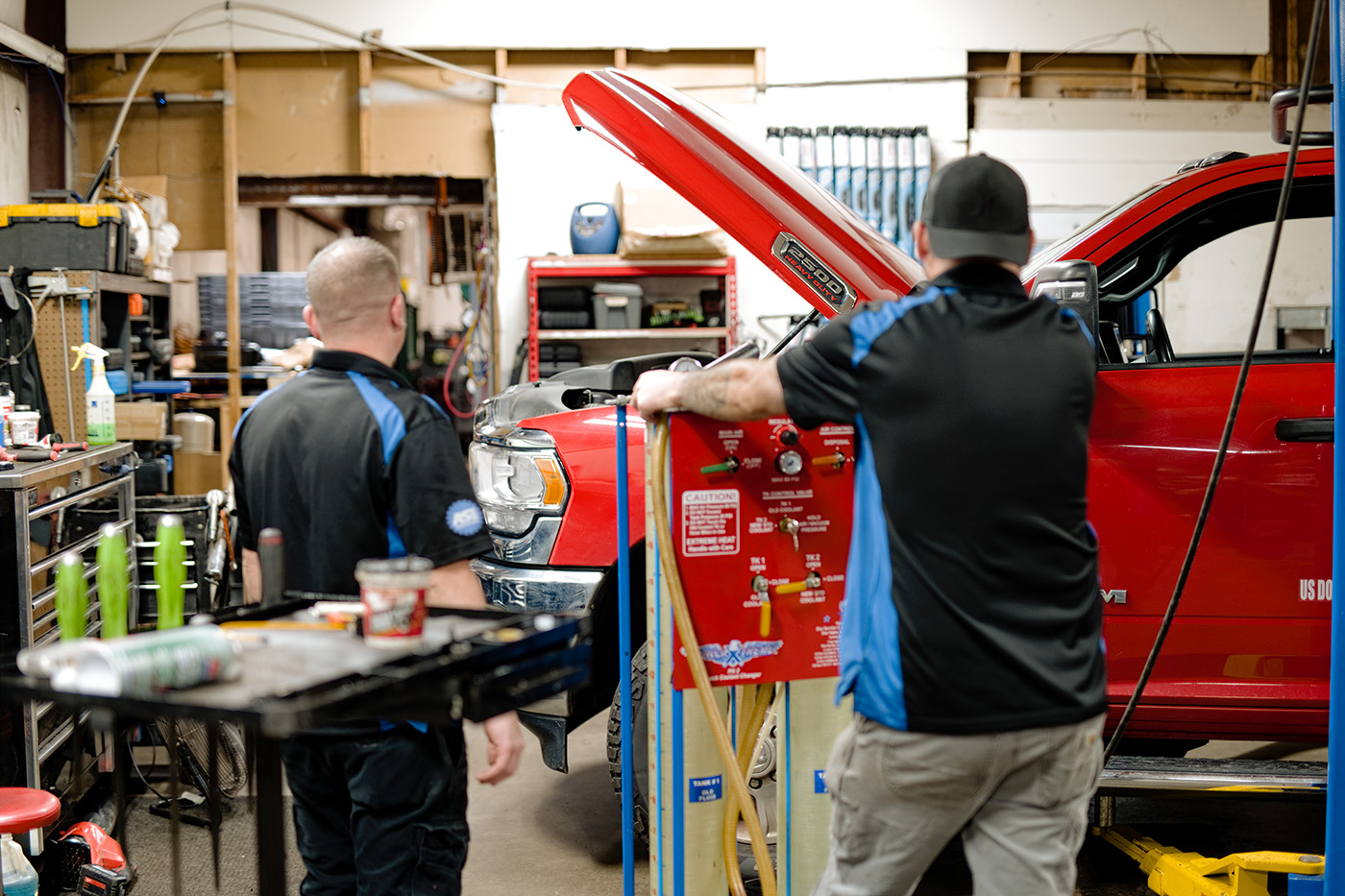 ASE-certified technician performing professional vehicle maintenance and repair at Primary Care Auto Repair in Warwick, Rhode Island.