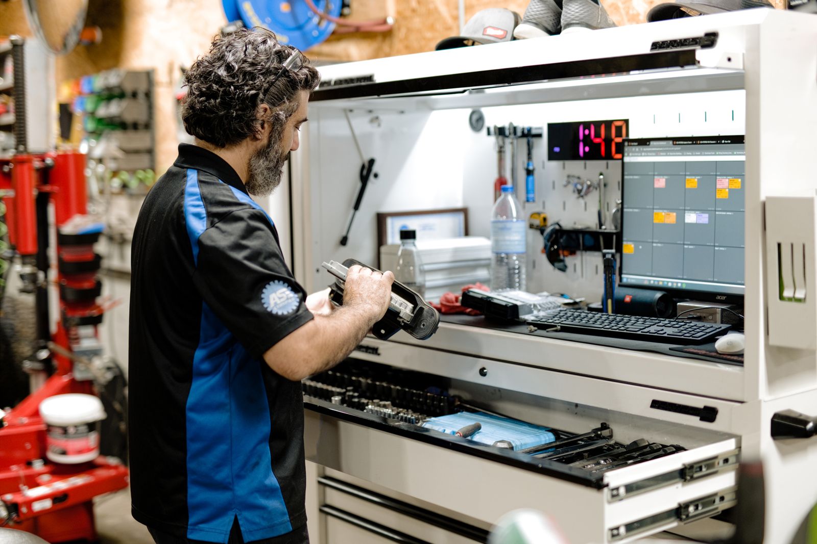 Technician at the shop tool station