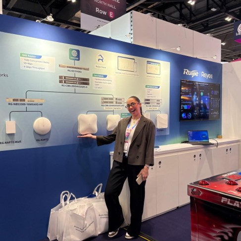 A member of The Change team presenting Ruijie access points on the network wall