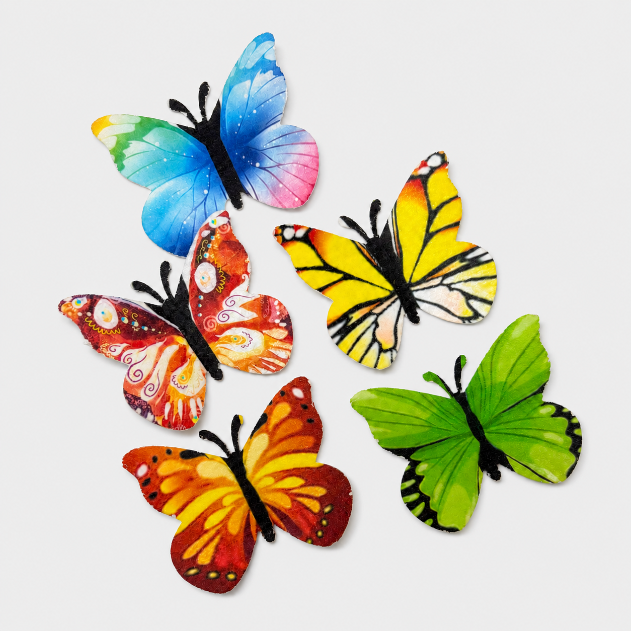 Farfalle fantasia in ostia 5,2 x 4,3 cm colori assortiti – Confezione da 100 unità